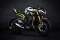 Both models now feature fully adjustable Öhlins NIX30 front suspension. Triumph Street Triple Moto2 Edition front three fourth studio shot.